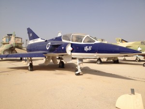 Dark blue and white fighter jet