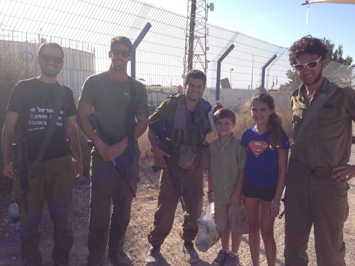 IDF soldiers guarding Iron Dome, on a visit by American tourists